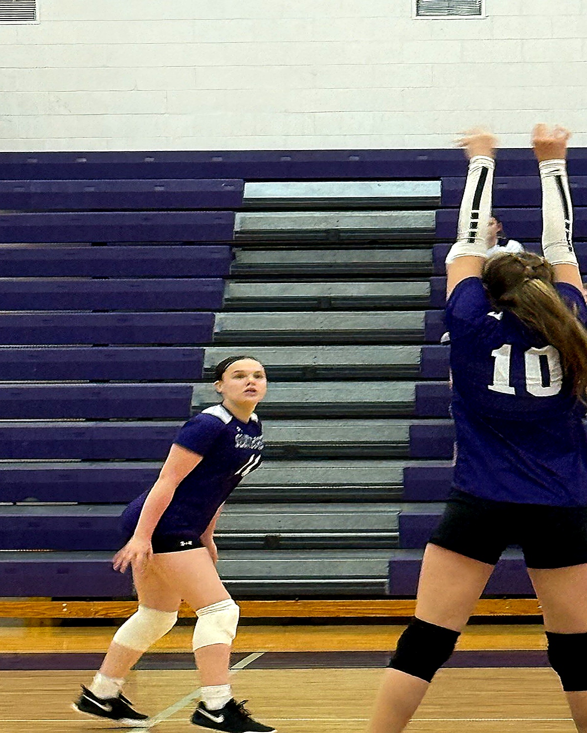 Jordan Young in ready position during volleyball match